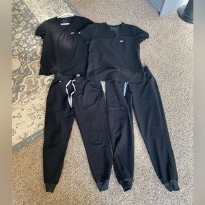 2 pairs of Figs black scrubs